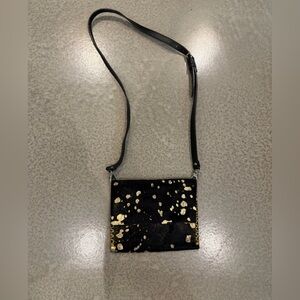 Elegant Black and Gold Crossbody Bag